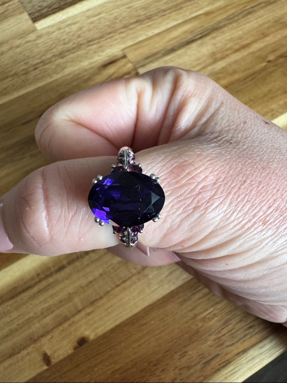 Woman's Silver Ring with Deep Purple Oval Gemstone